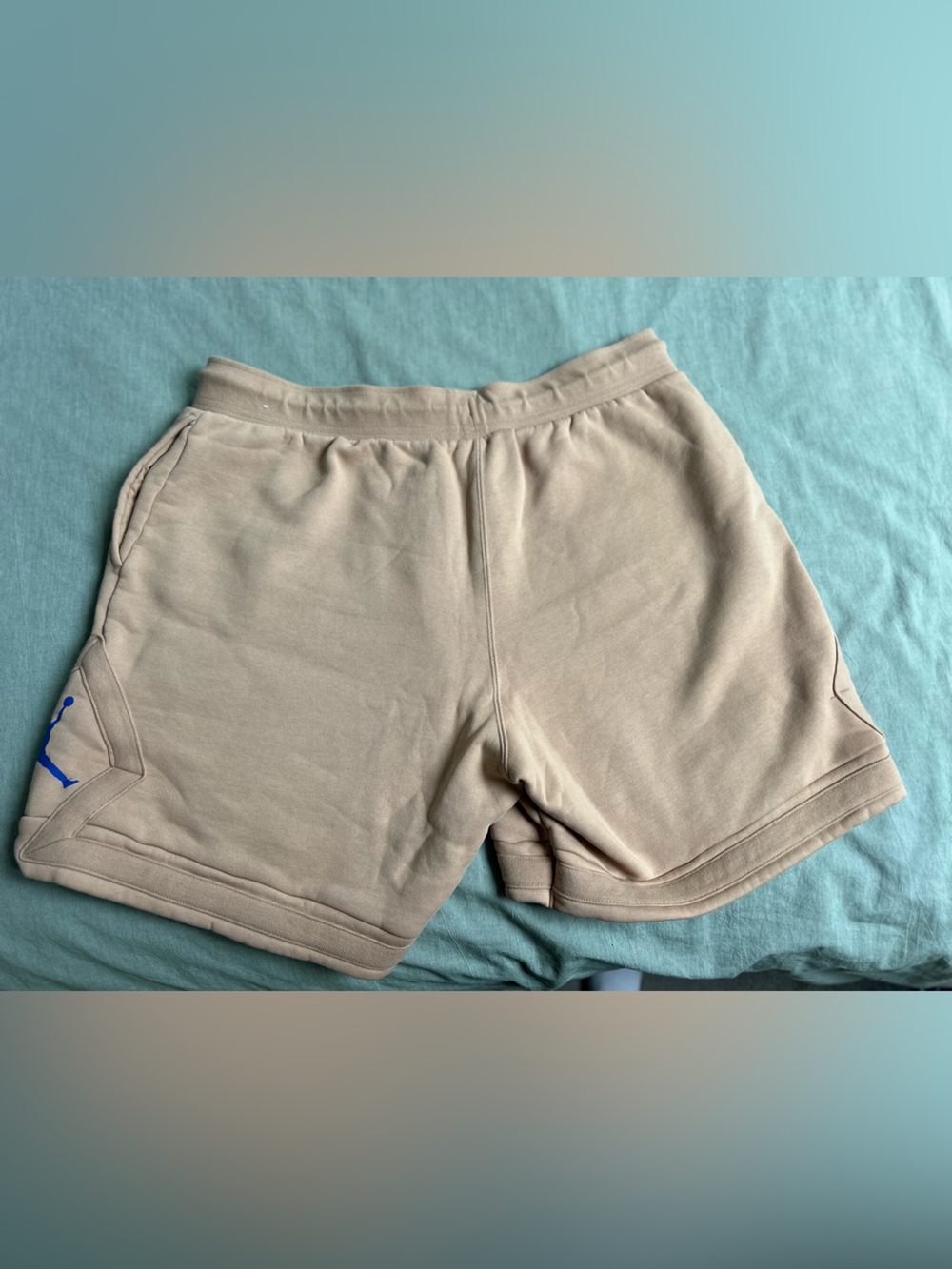 Jordan Beige Athletic Shorts with Blue Jumpman Accent